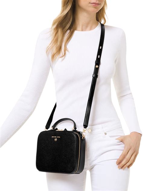 michael kors backpack charm|are Michael Kors purses leather.